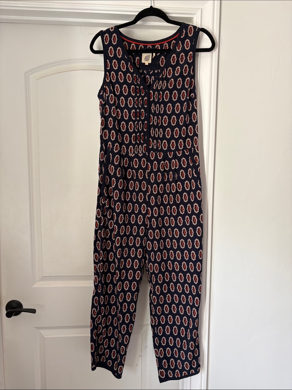Anthropologie Lilia Navy Jumpsuit with Rust Geometric Print